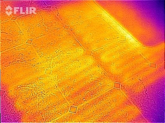 Thermal image of radient flooring coils in the floor of the bathroom.